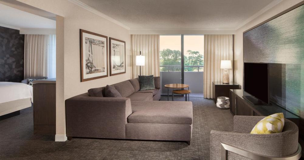 One-Bedroom Suite with Sofa Bed and Balcony interior